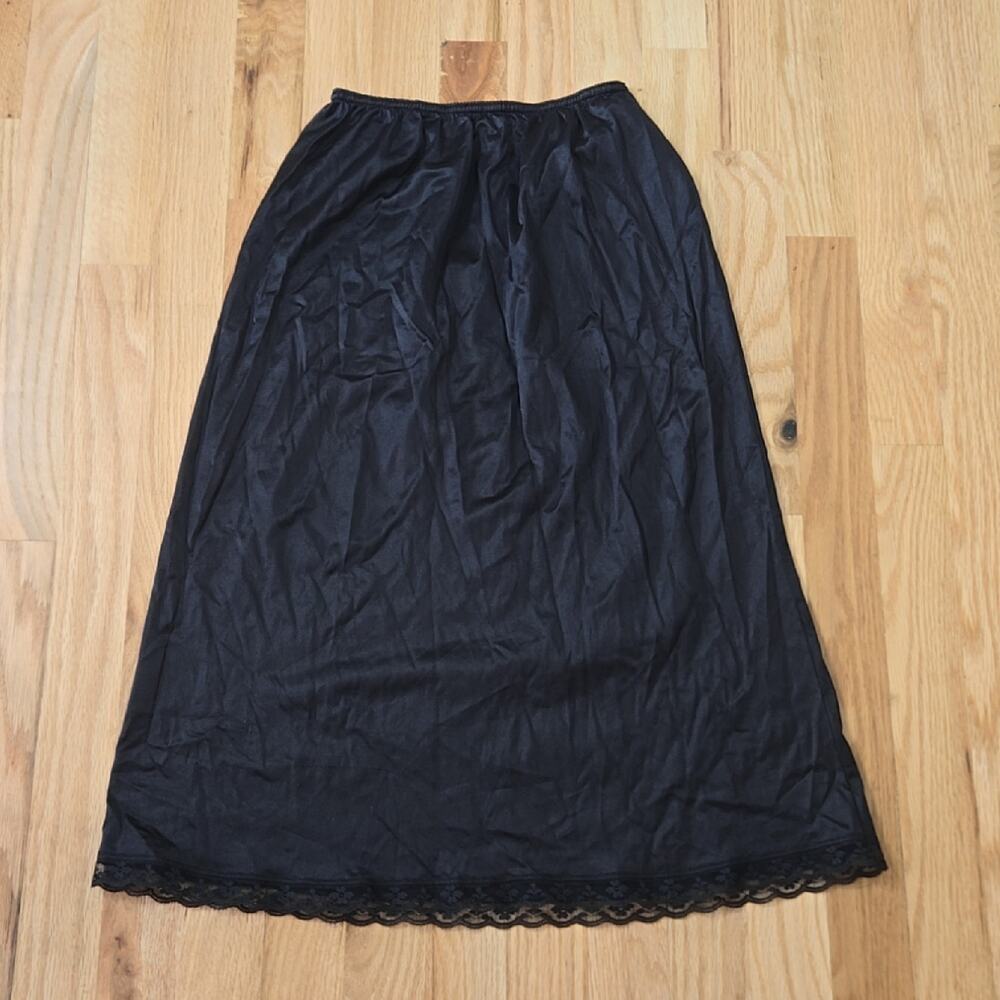 Vintage Warners Black Nylon and lace women's Half slip size Small